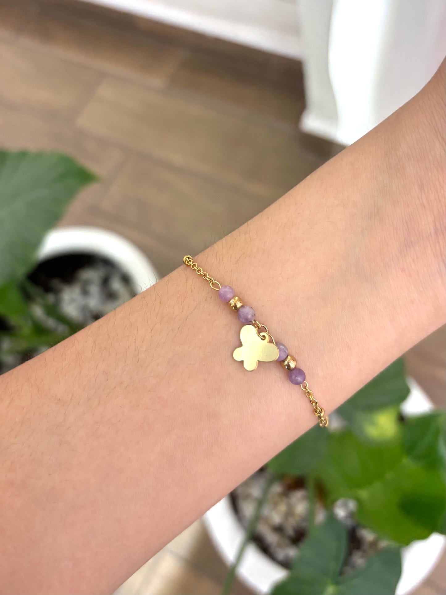 Pulsera morada de mariposa