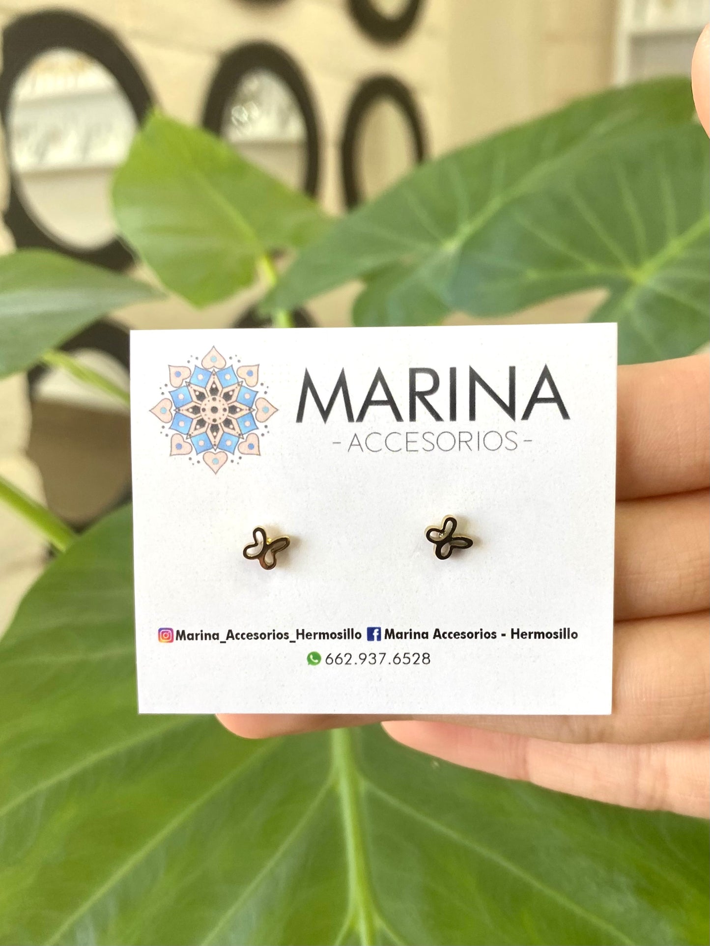 Broquel de acero mariposa