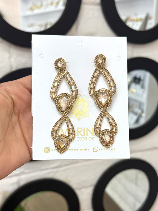 Aretes de pedrería dorados