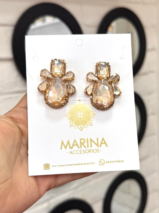 Aretes de pedrería dorados