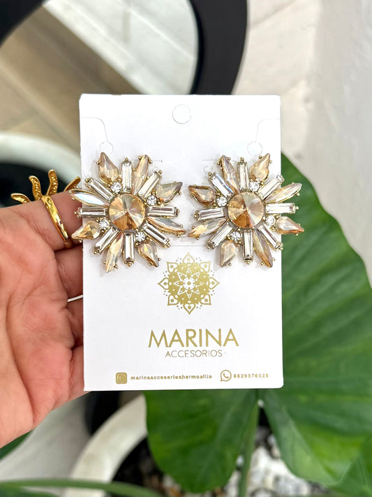 Aretes de pedrería dorados