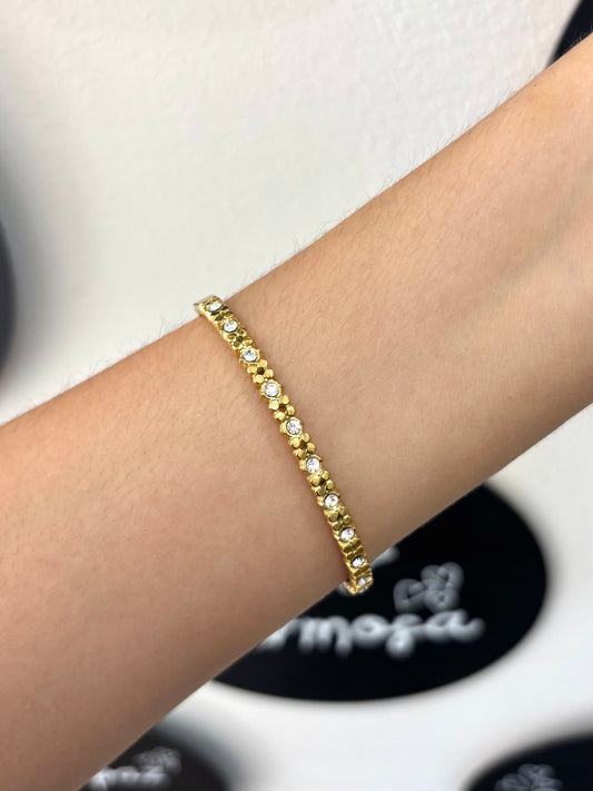 Pulsera dorada con brillos