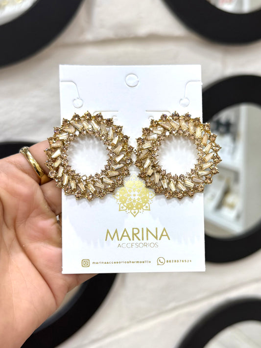Aretes de pedrería dorados