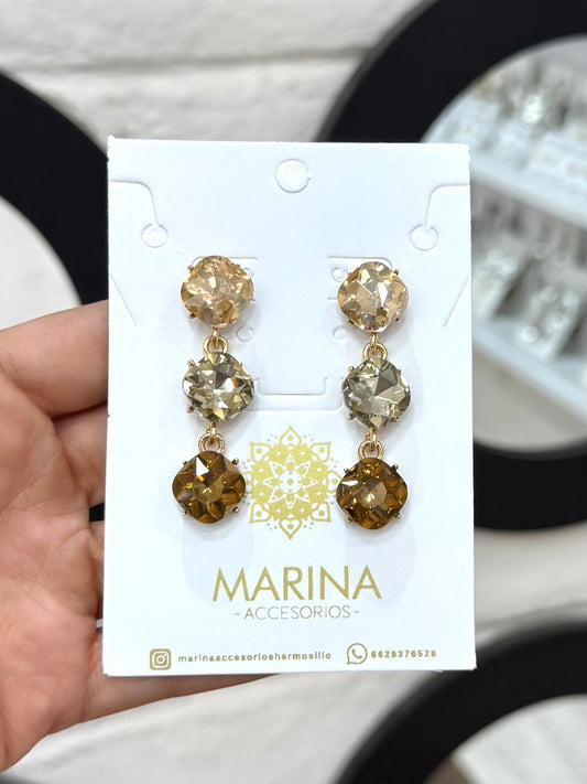 Aretes de pedrería dorados