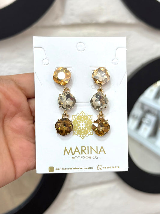 Aretes de pedrería dorados
