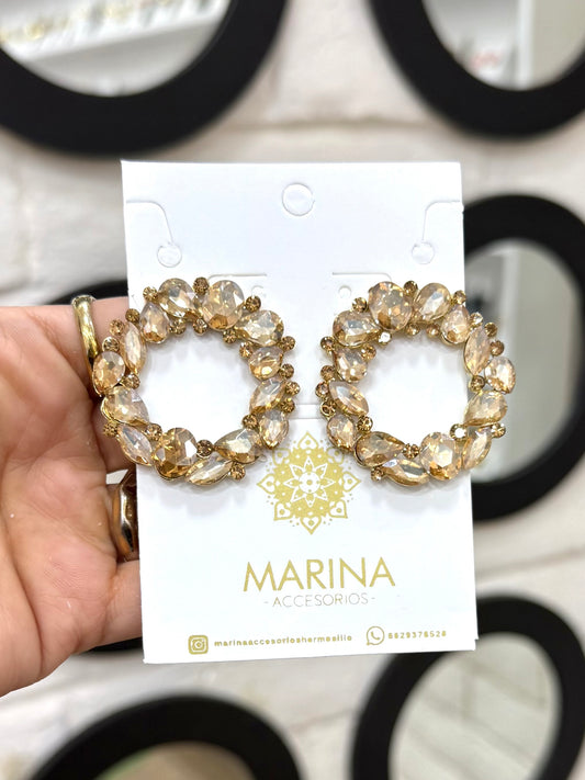 Aretes de pedrería dorados