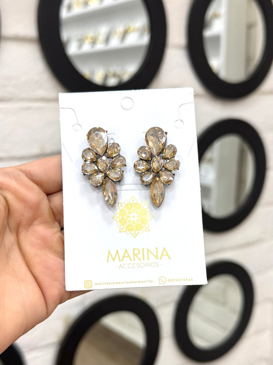 Aretes de pedrería dorados