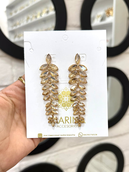 Aretes de pedrería dorados
