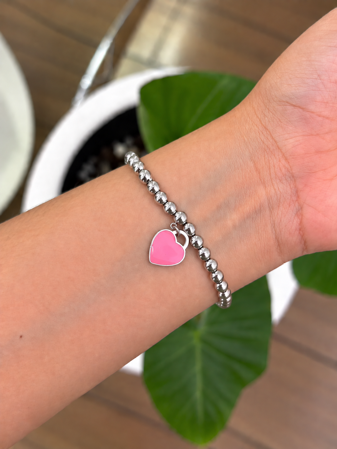Pulsera corazón rosa