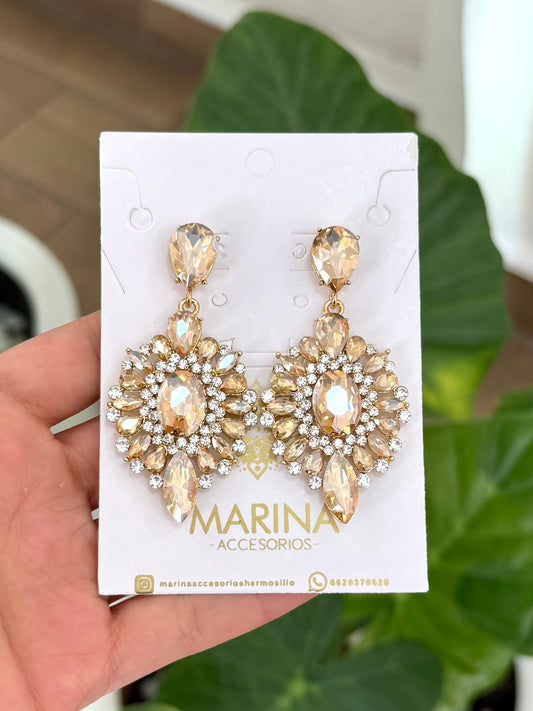 Aretes de pedrería dorados