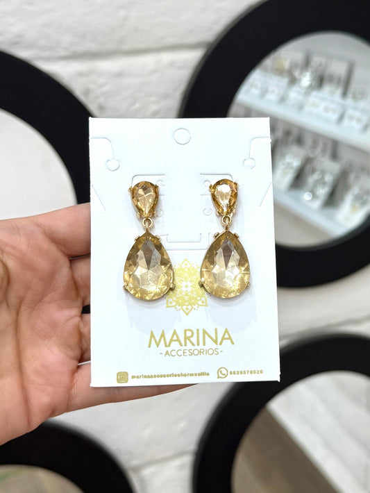 Aretes de pedrería dorados