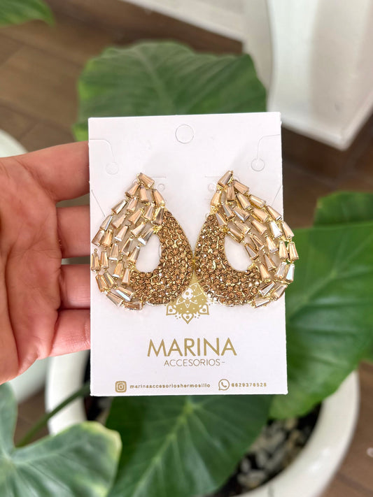 Aretes de pedrería dorados