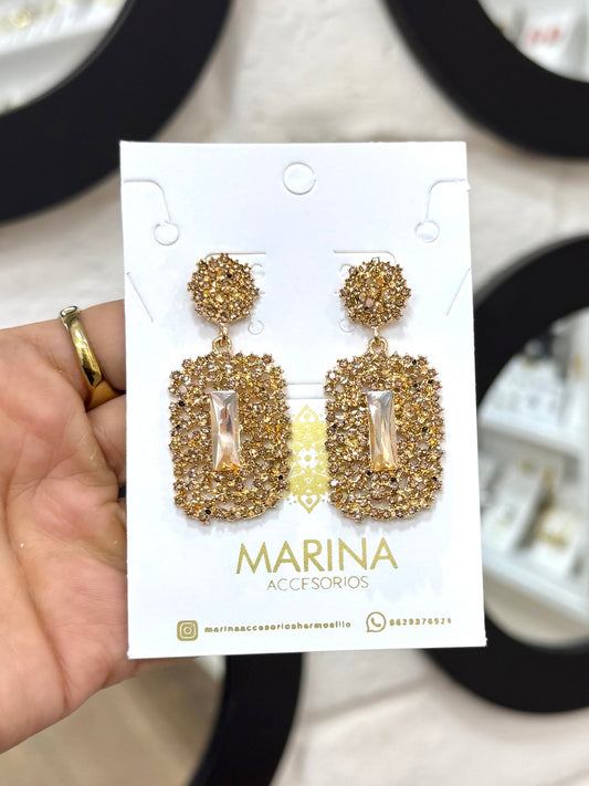 Aretes de pedrería dorados