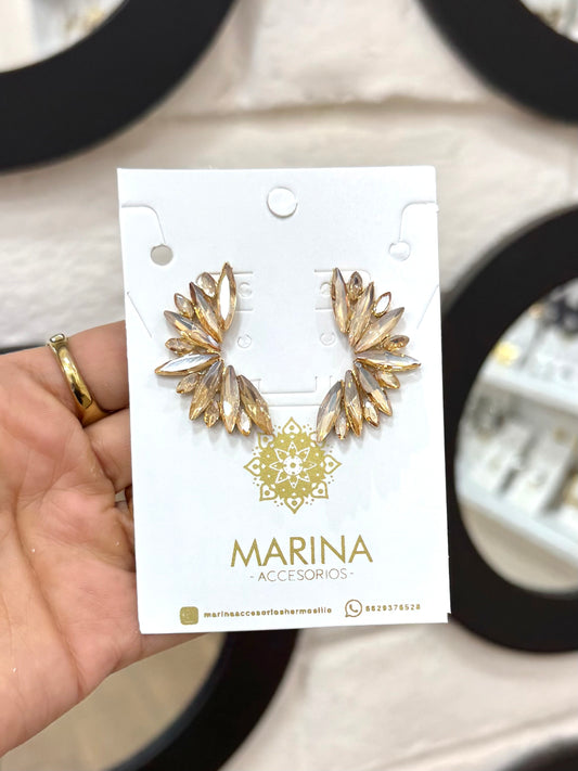 Aretes de pedrería dorados