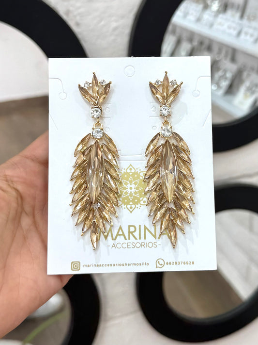 Aretes de pedrería dorados