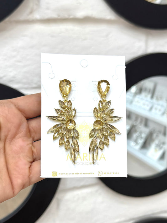 Aretes de pedrería dorados